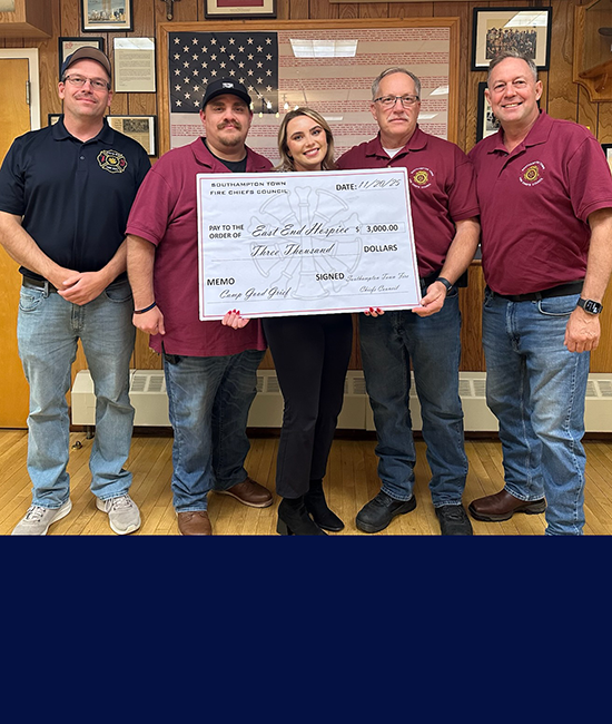 Fire Chiefs from Southampton Town are presenting a big $3000 check as a donation to East End Hospice